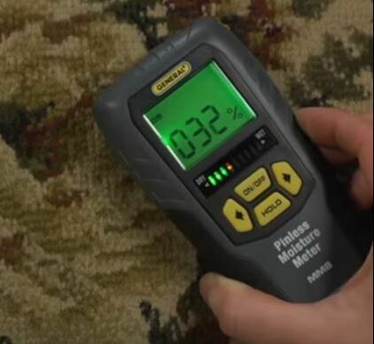 Moisture Meter Checks Humidity of Carpet Hero Mold Removal VA